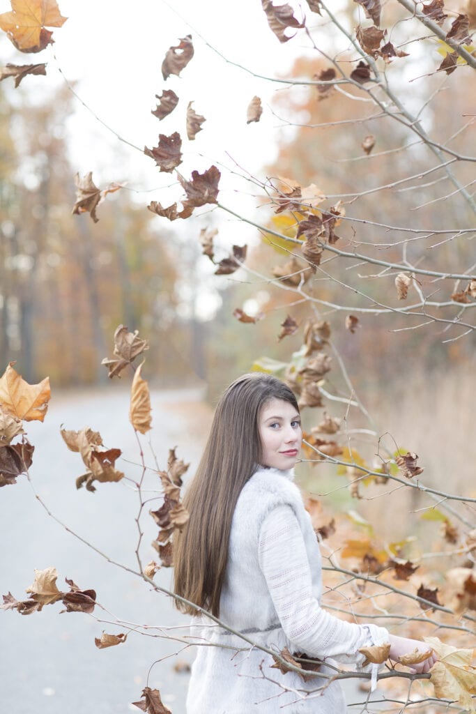 Gilr in fall leaves Leesburg Virginia