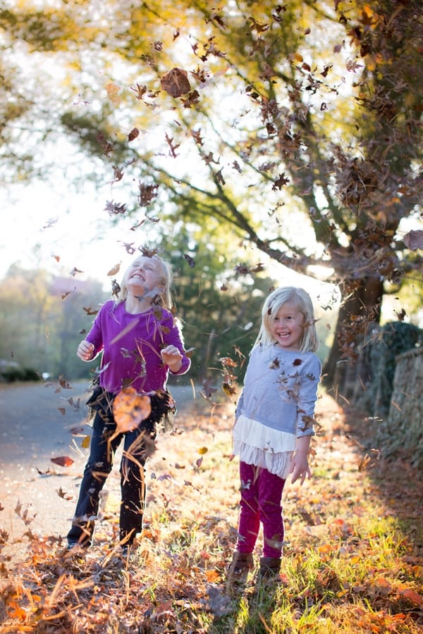 Girls in fall leaves Middleburg VIrginia