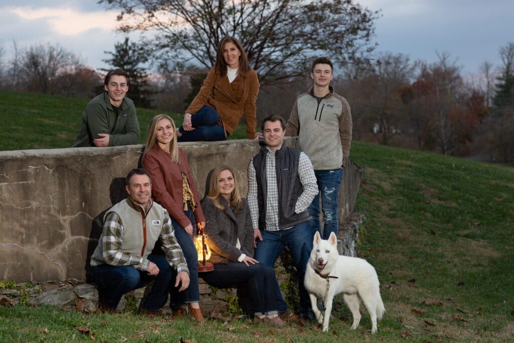 Family at Morven Park at dusk in fall colors