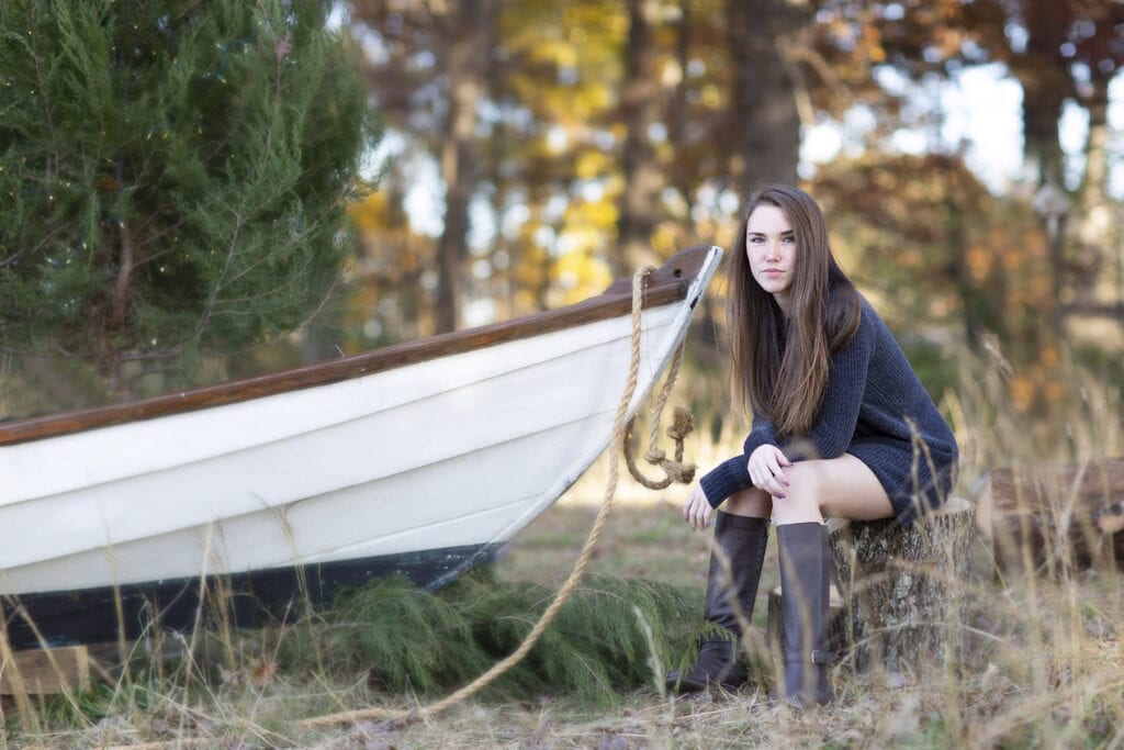 girl with old boat in field leesburg 