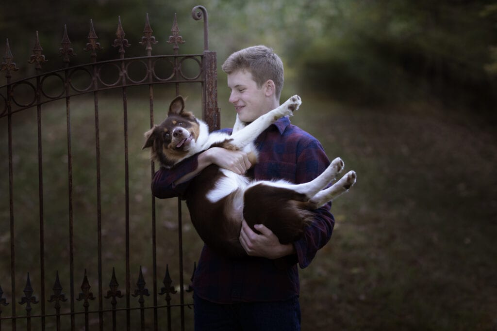 senior picture a boy and his dog