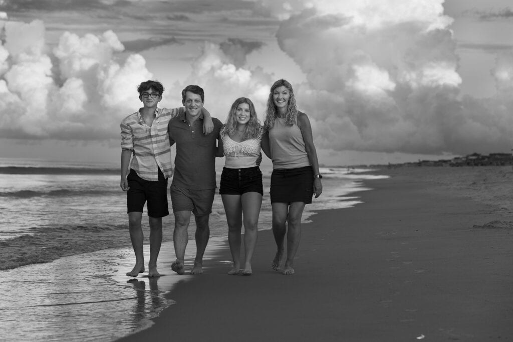 Black and white with dramatic clouds on beach