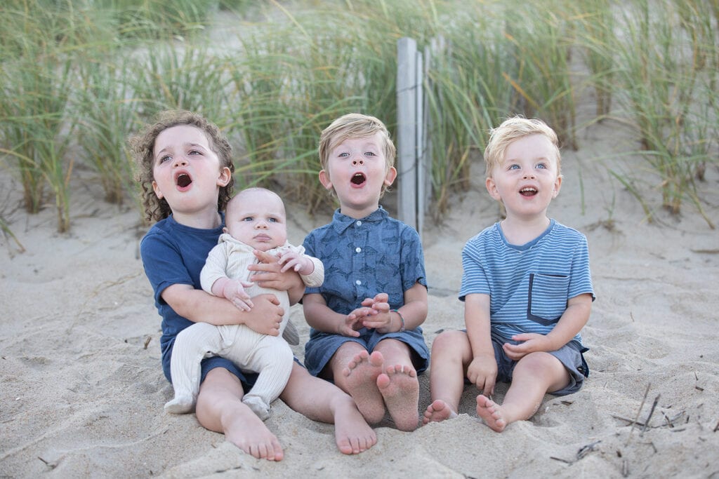 4 boy cousins on beach