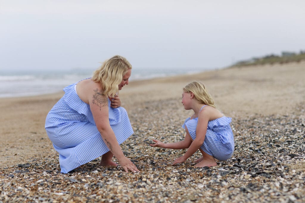 mother and daughter on beach in Sanderling nc