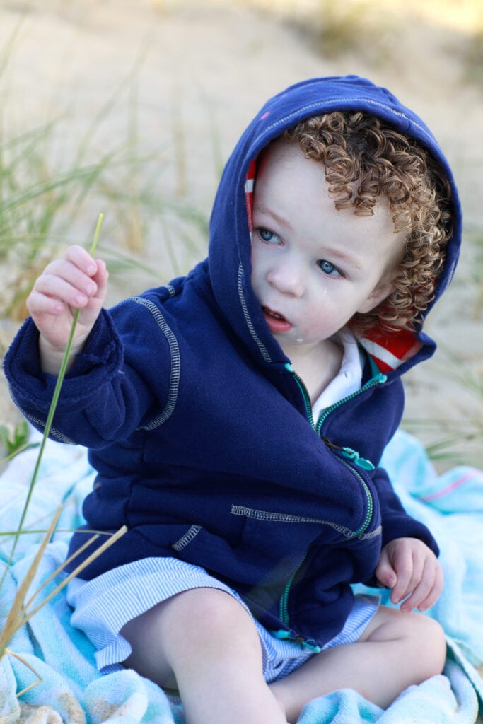 small boy with curls in Duck NC