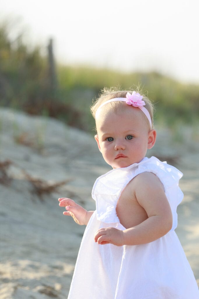 Beautiful little girl on the beach, Sanderling NC