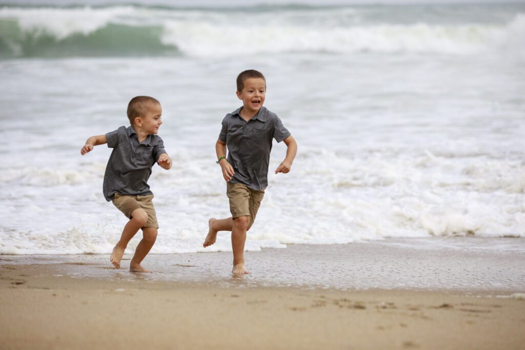 Boys Runing on beach Duck NC