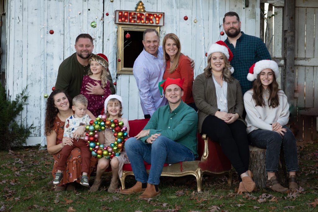 large family enjoying a holiday photo session in Leesburg 