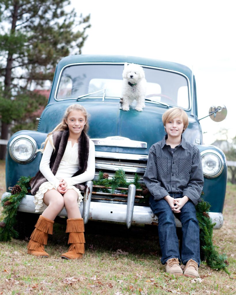 Vintage truck with kids and their dog