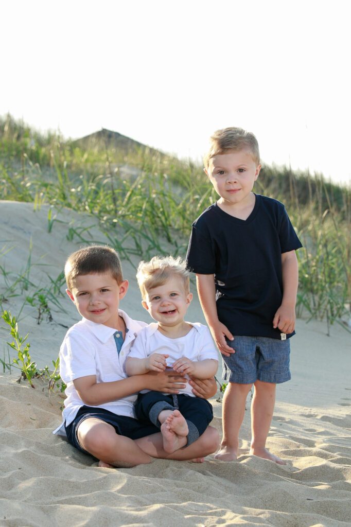 Three little boys on the beach in Nags Head
