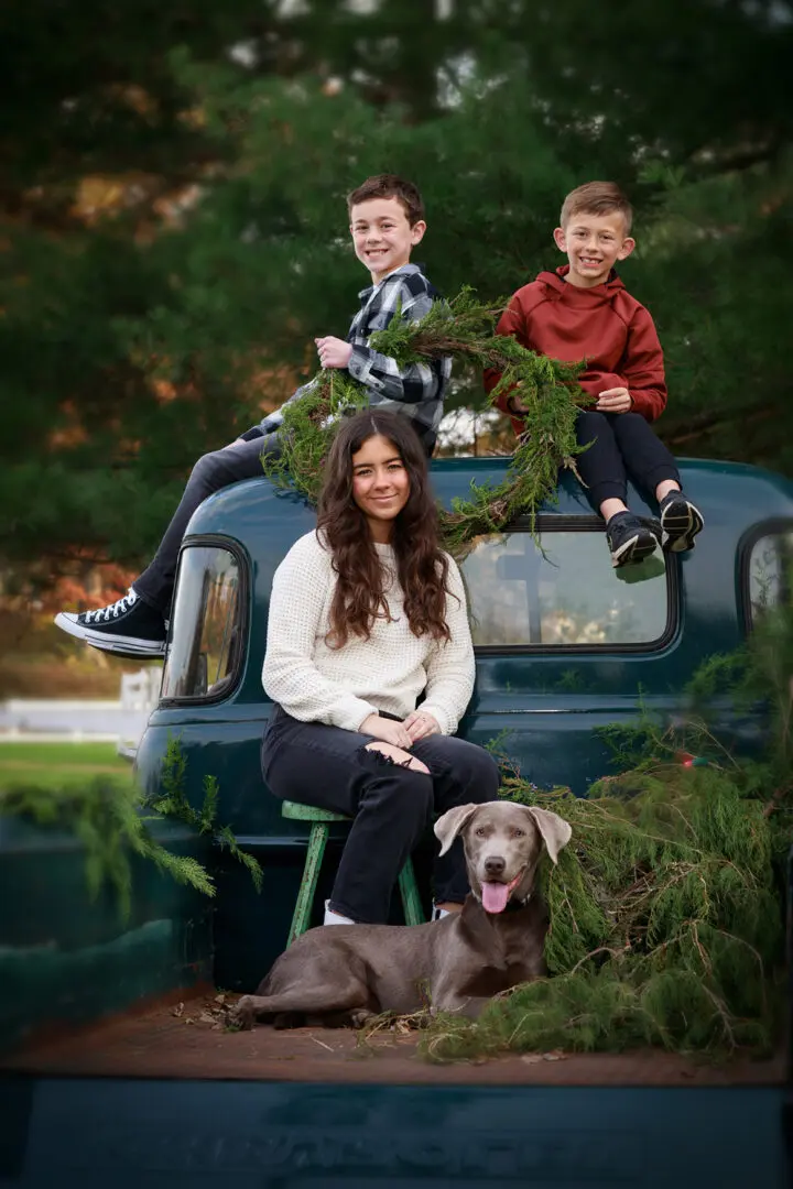 Kids on old truck with dog leesburg Virginia