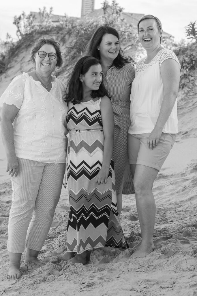 Black and white photo on beach in Duck,NC, three generations