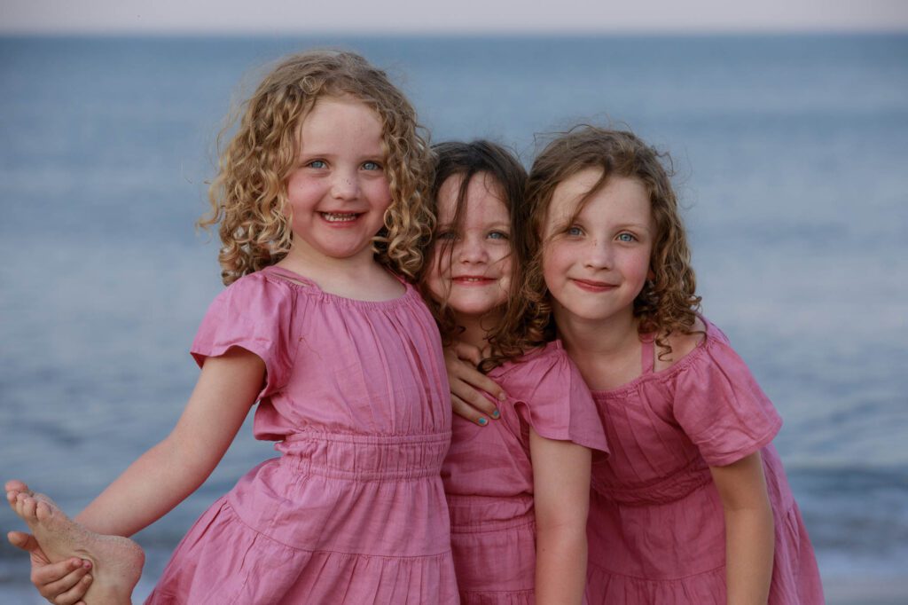 three little sisters enjoying the beach, Duck NC