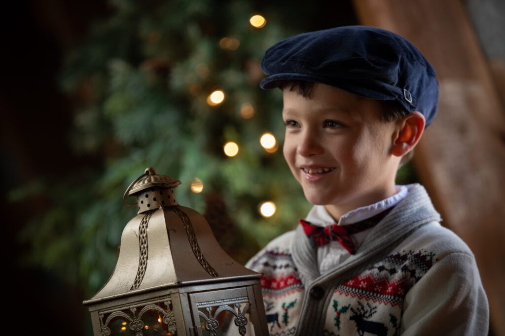 Little boy with lantern in a holiday style setting Waterford Virginia