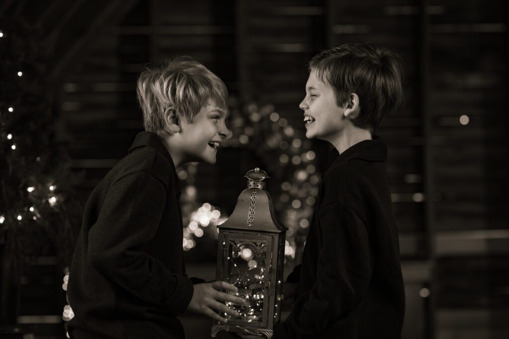 brothers laughing in a cheerful holiday enviroment