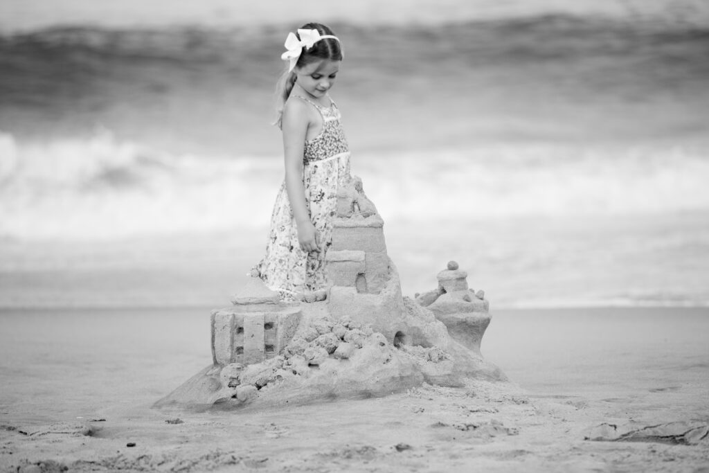 Girl with sand castle, Duck, NC