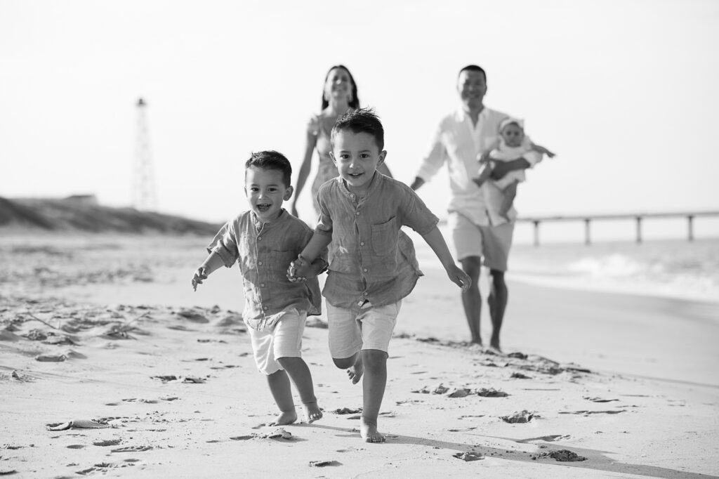 Brother running on the beach in Duck ,NC