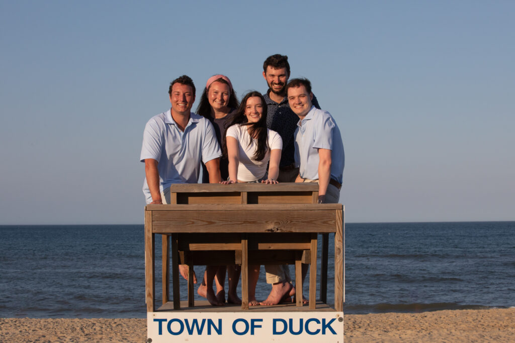 older siblings in the life Guard stand in Duck NC