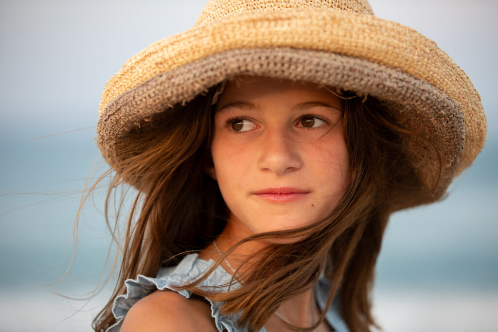 girl at golden hour on the beach in duck nc