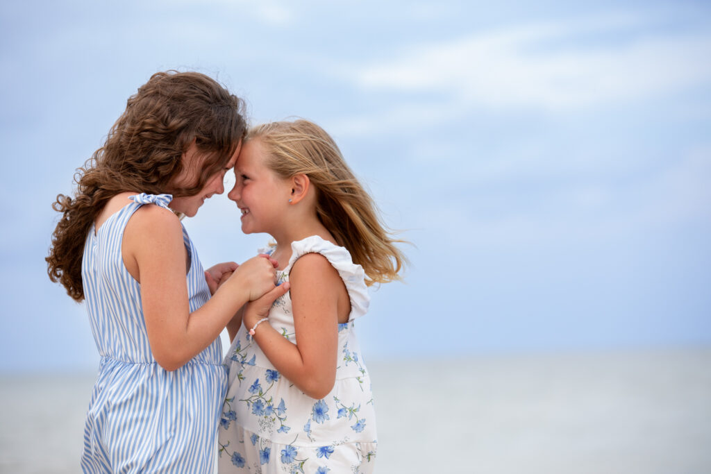 sisters by the ocean in Duck, NC