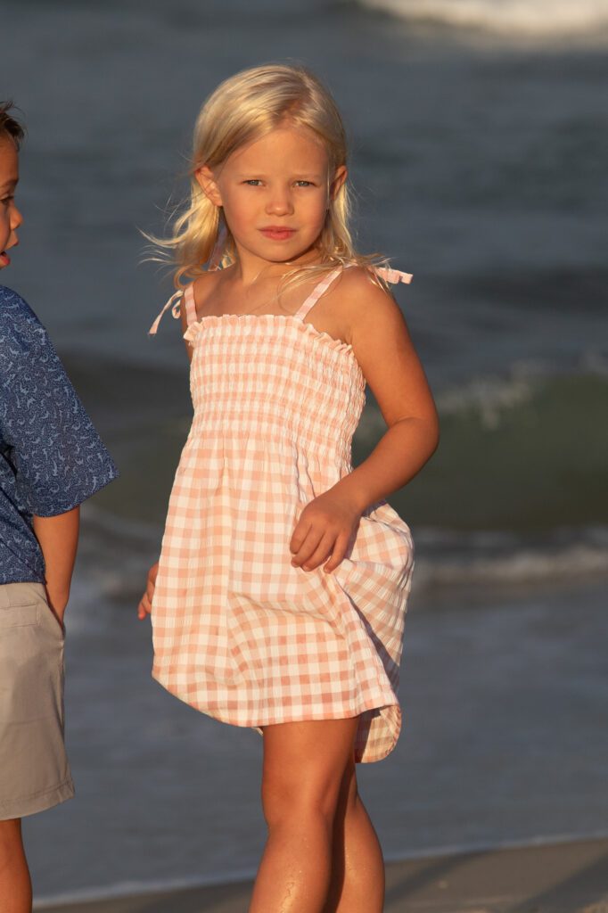 Vintage looking image of little girl on the beach in Duck, NC