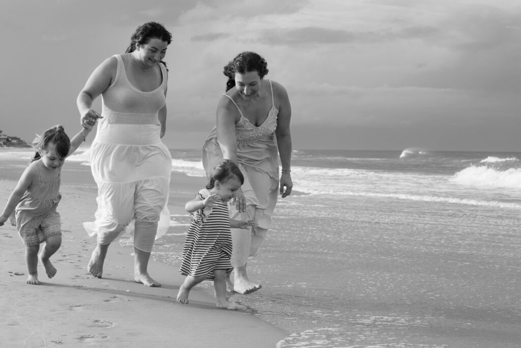 Black and white on the beach with dramatic sky in The Outer Banks of NC