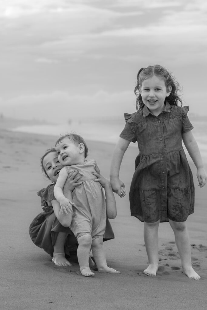 Black and White photo in storm clouds at the beach in Duck, NC