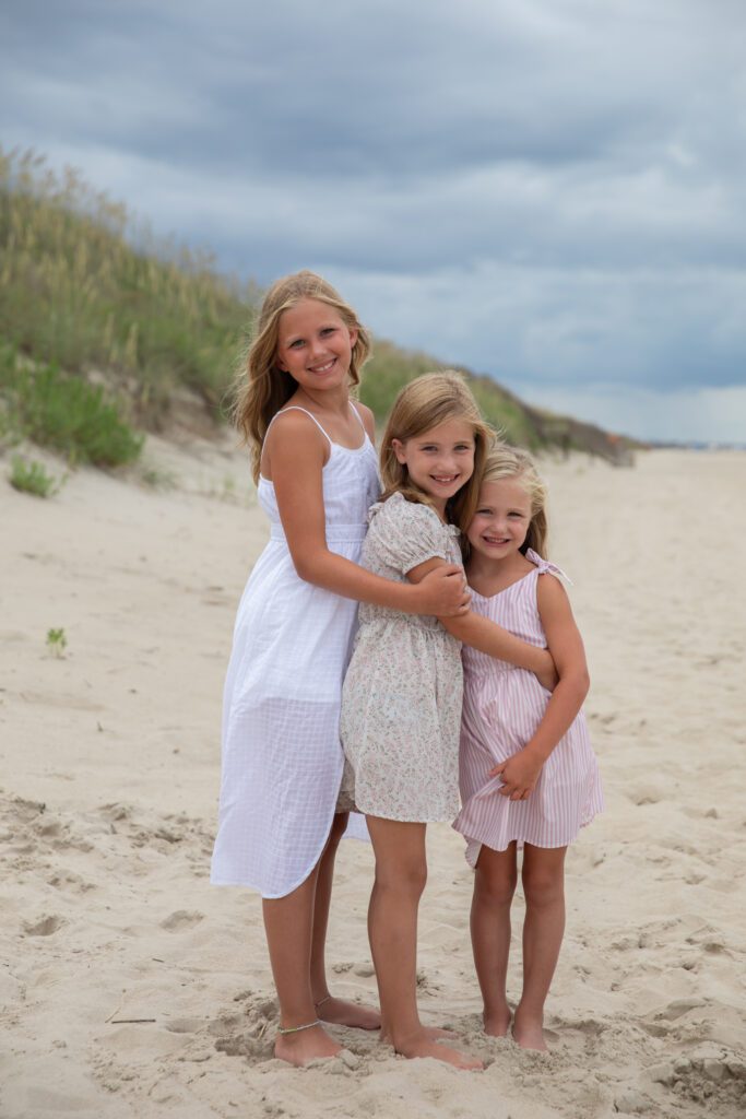 Sisters on the beach in Corolla, NC