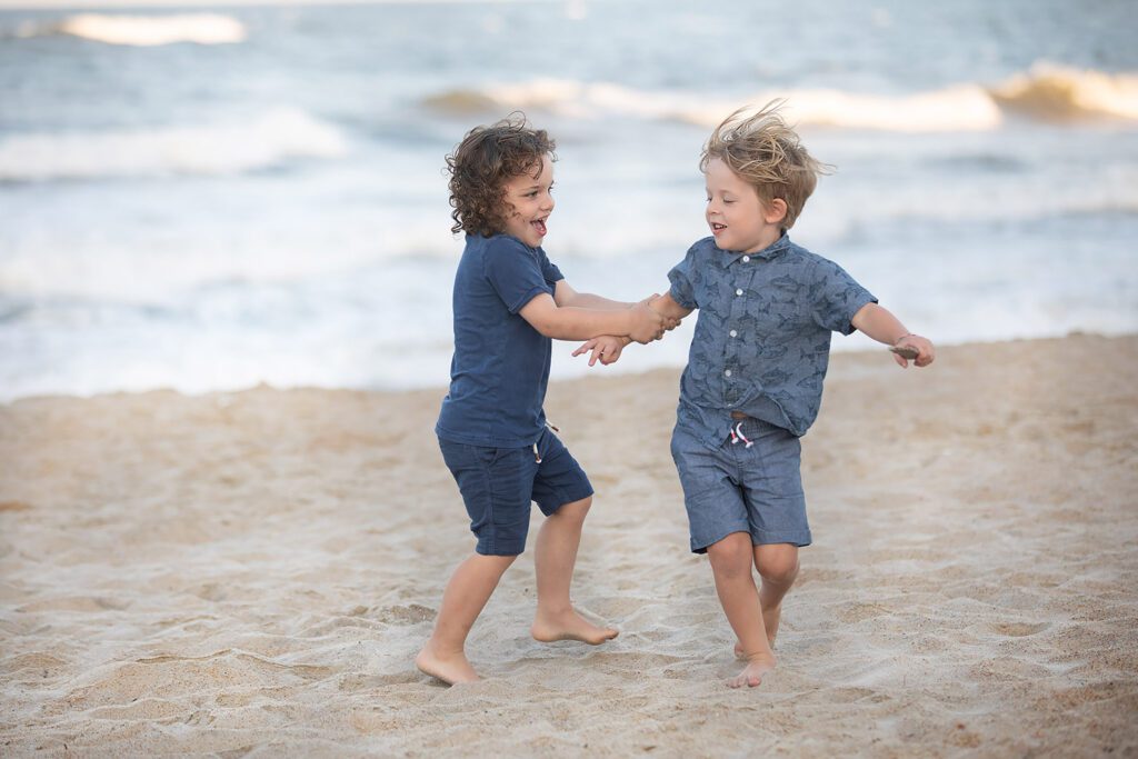 two boys playin on the beach Duck, NC